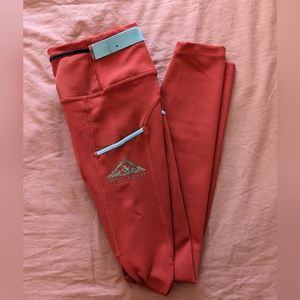 Nike epic luxe trail running legging (red/teal, medium)